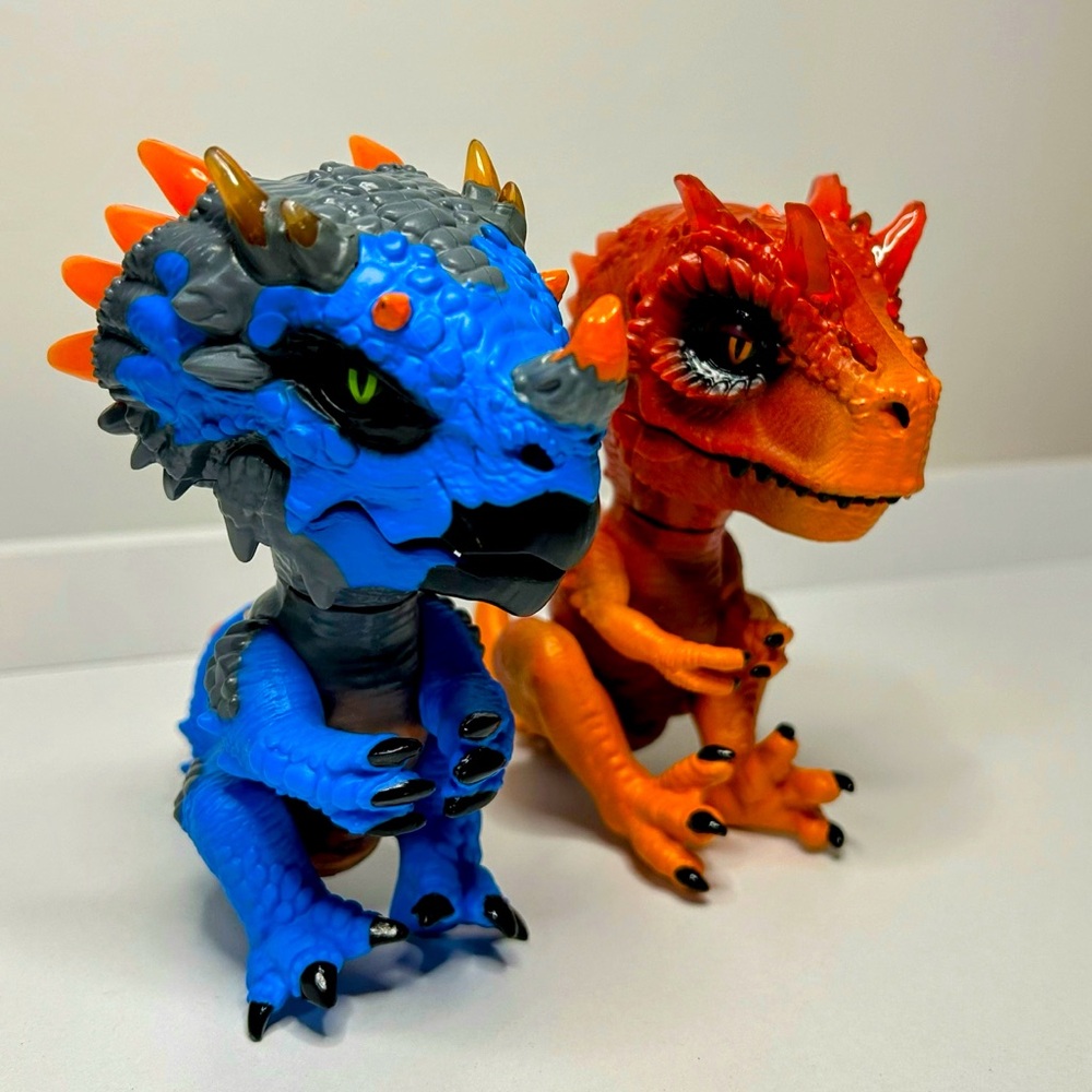 Wowwee Untamed Radioactive Triceratops And T-Rex Fingerlings Dinosaurs Set Of 2